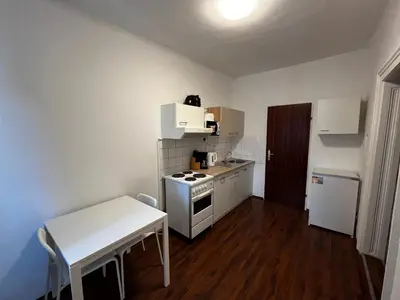 Küche/Küchenzeile in der Unterkunft Helle DG-Wohnung in Wien I Ruhig, modern & zentral