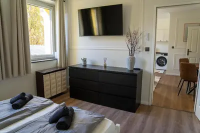 Ein Bett oder Betten in einem Zimmer der Unterkunft Family Apartment Schönbrunn I Modern & Zentral