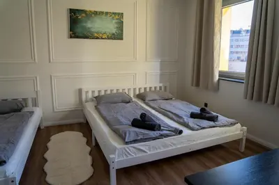 Ein Bett oder Betten in einem Zimmer der Unterkunft Family Apartment Schönbrunn I Modern & Zentral