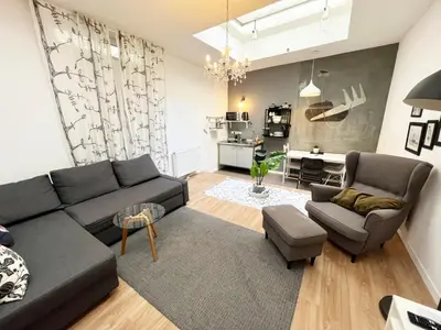 Ein Sitzbereich in der Unterkunft Frisierzimmer Art Lofts