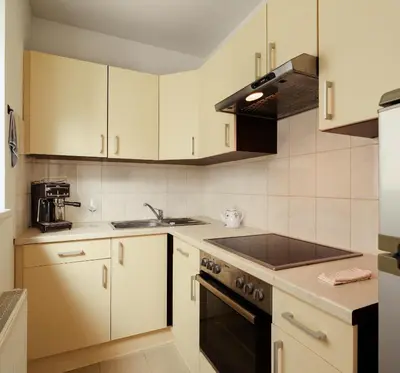 Küche/Küchenzeile in der Unterkunft Delightful Apartment with Private Balcony in Perfect Location of Vienna