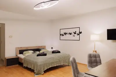 Ein Bett oder Betten in einem Zimmer der Unterkunft Delightful Apartment with Private Balcony in Perfect Location of Vienna