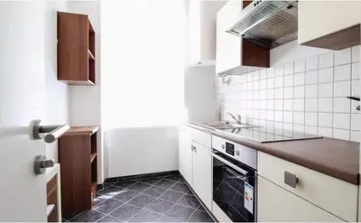 Küche/Küchenzeile in der Unterkunft Cosy Apartment near Metro & Center