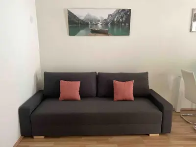 Ein Sitzbereich in der Unterkunft Cosy Apartment near Metro & Center