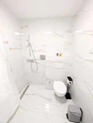 Ein Badezimmer in der Unterkunft Cozy Apartment in Landstrasse area BR2