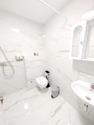 Ein Badezimmer in der Unterkunft Cozy Apartment in Landstrasse area BR2