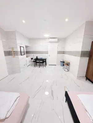 Ein Bett oder Betten in einem Zimmer der Unterkunft Cozy Apartment in Landstrasse area BR2