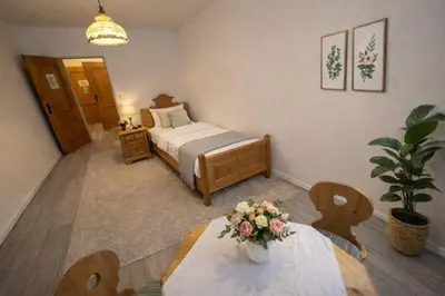Ein Bett oder Betten in einem Zimmer der Unterkunft Pension Ursula