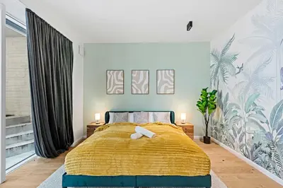 Ein Bett oder Betten in einem Zimmer der Unterkunft Green Jungle Oasis - Central Vienna