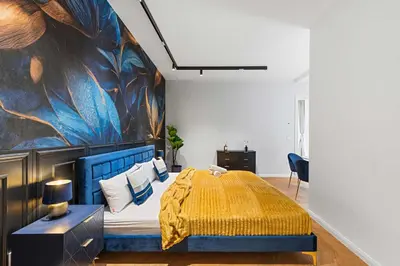 Ein Bett oder Betten in einem Zimmer der Unterkunft Royal Hideout - Central Vienna