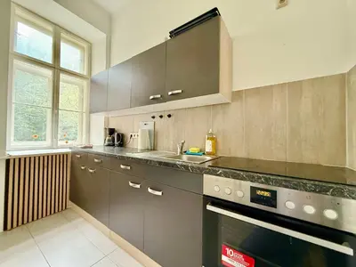 Küche/Küchenzeile in der Unterkunft Stylish Cosy 2 Bedroom Apartment with Free Parking