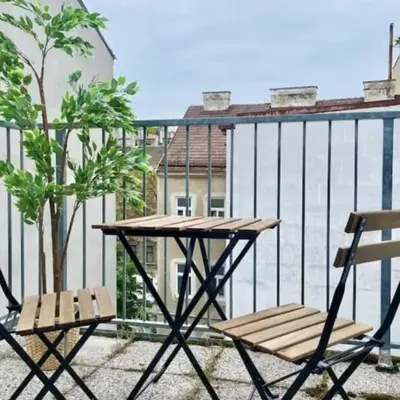 Rooftop Central Apartment with Balcony & Free Parking