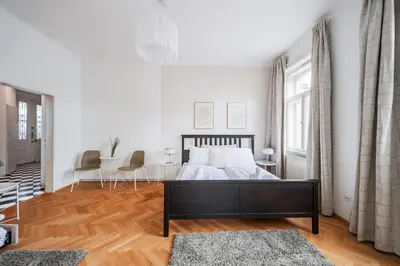 Ein Bett oder Betten in einem Zimmer der Unterkunft Central Cozy Schönbrunn Apartment