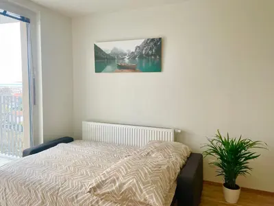 Ein Bett oder Betten in einem Zimmer der Unterkunft 55 m2 Stylish Apartment with Balcony & Free Parking