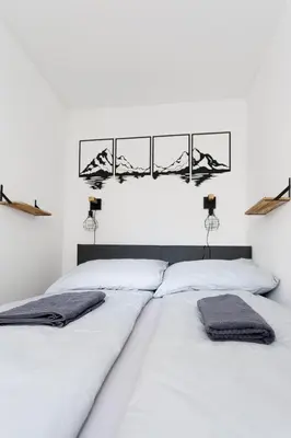 Ein Bett oder Betten in einem Zimmer der Unterkunft Luxury Modern Apartment with Balcony