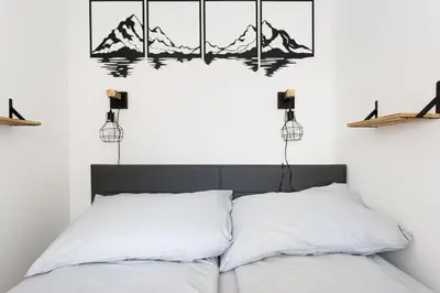 Ein Bett oder Betten in einem Zimmer der Unterkunft Luxury Modern Apartment with Balcony