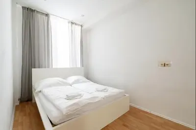 Ein Bett oder Betten in einem Zimmer der Unterkunft Central Stone Stylish Apartment