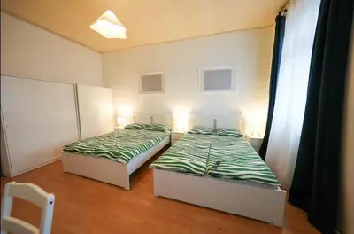 Ein Bett oder Betten in einem Zimmer der Unterkunft Cosy Apartment near Center