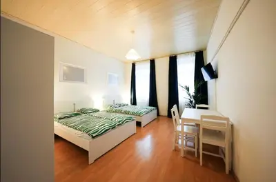 Ein Bett oder Betten in einem Zimmer der Unterkunft Cosy Apartment near Center