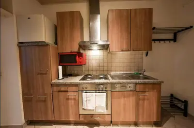 Küche/Küchenzeile in der Unterkunft Cosy Apartment near Center