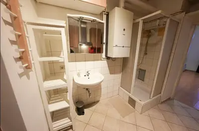 Ein Badezimmer in der Unterkunft Cosy Apartment near Center