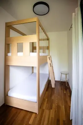 Ein Bett oder Betten in einem Zimmer der Unterkunft Strommer wine das Gästehaus