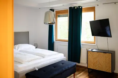 Ein Bett oder Betten in einem Zimmer der Unterkunft Strommer wine das Gästehaus