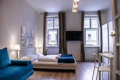 Ein Bett oder Betten in einem Zimmer der Unterkunft Modern Apartment in Wiener Stadthalle Area