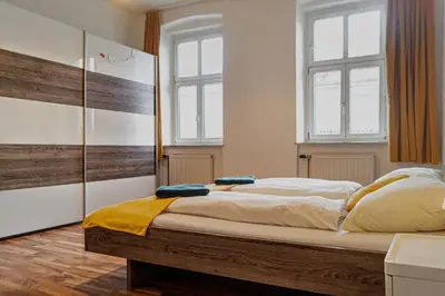 Ein Bett oder Betten in einem Zimmer der Unterkunft Cozy 2BR Apartment Very Central, Ideal for Long Stays