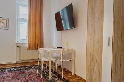 TV/Unterhaltungsangebot in der Unterkunft Cozy 2BR Apartment Very Central, Ideal for Long Stays