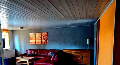 Ein Sitzbereich in der Unterkunft Chalet Steppuhn