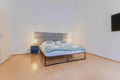 Ein Bett oder Betten in einem Zimmer der Unterkunft Spacious Private Rooms in a Shared Apartment in Vienna
