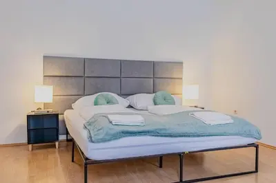 Ein Bett oder Betten in einem Zimmer der Unterkunft Spacious Private Rooms in a Shared Apartment in Vienna