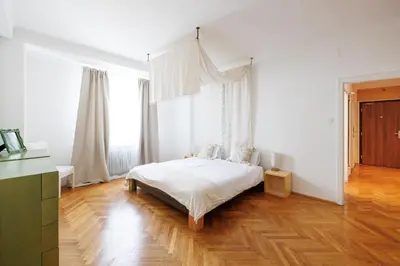 Ein Bett oder Betten in einem Zimmer der Unterkunft Operastreet Residences - Piano Suite