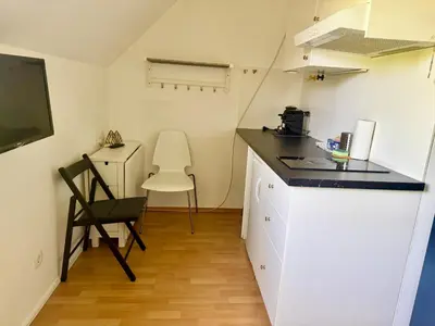 Küche/Küchenzeile in der Unterkunft Cozy City Apartment - Free Parking & Fitness