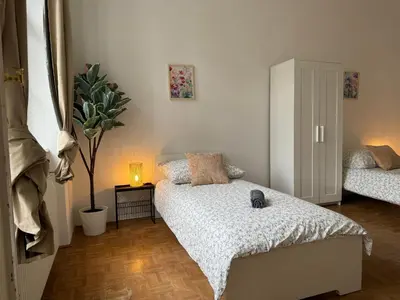 Ein Bett oder Betten in einem Zimmer der Unterkunft 130 m2 Spacious Apartment