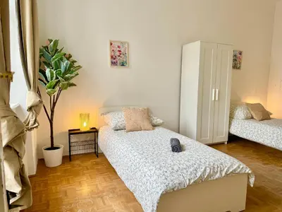 Ein Bett oder Betten in einem Zimmer der Unterkunft 130 m2 Spacious Apartment