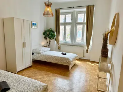 Ein Bett oder Betten in einem Zimmer der Unterkunft 130 m2 Spacious Apartment