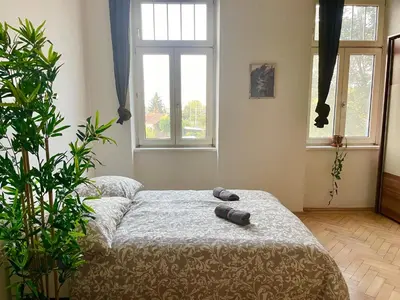 Ein Bett oder Betten in einem Zimmer der Unterkunft Cozy Long-Term Apartment