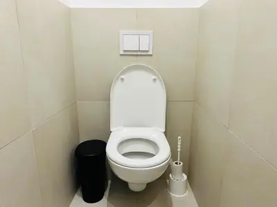 Ein Badezimmer in der Unterkunft Long Term Central Apartment