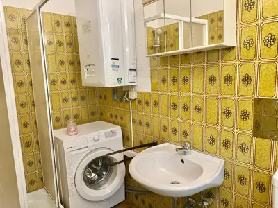 Ein Badezimmer in der Unterkunft Central Long-Term Apartment - near First District