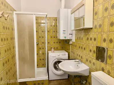 Ein Badezimmer in der Unterkunft Central Long-Term Apartment - near First District