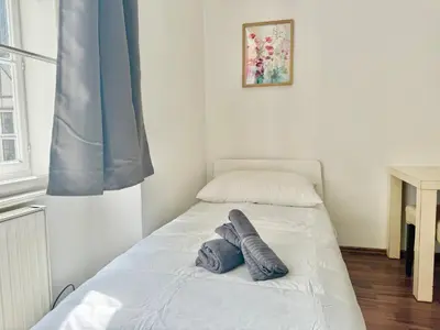 Ein Bett oder Betten in einem Zimmer der Unterkunft Central Long-Term Apartment - near First District
