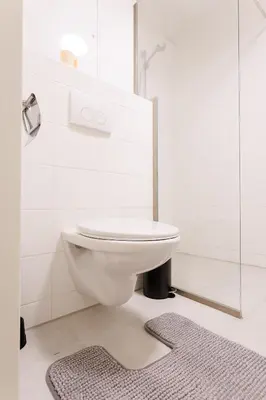 Ein Badezimmer in der Unterkunft Modern Apartment with Balcony near Central Station