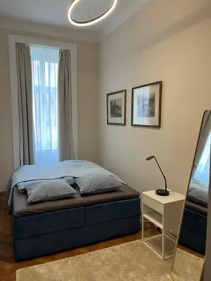 Ein Bett oder Betten in einem Zimmer der Unterkunft Appartement Mondscheingasse