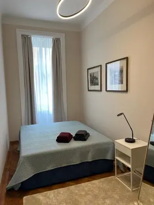 Ein Bett oder Betten in einem Zimmer der Unterkunft Appartement Mondscheingasse