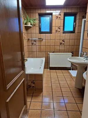 Ein Badezimmer in der Unterkunft Ferienhaus mit Garten
