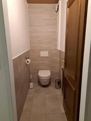 Ein Badezimmer in der Unterkunft Ferienhaus mit Garten