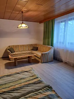 Ein Sitzbereich in der Unterkunft Ferienhaus mit Garten