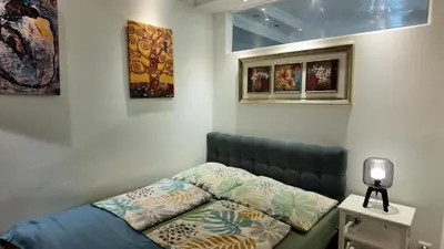 Ein Bett oder Betten in einem Zimmer der Unterkunft Cozy City Apartment - U3 Johnstraße & Stadthalle